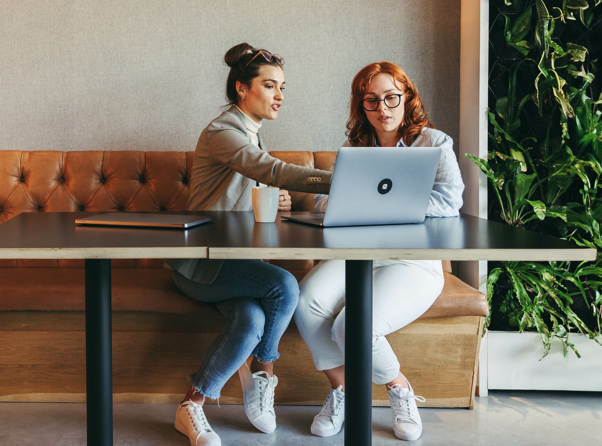 Two Women Working with One Laptop-1-1